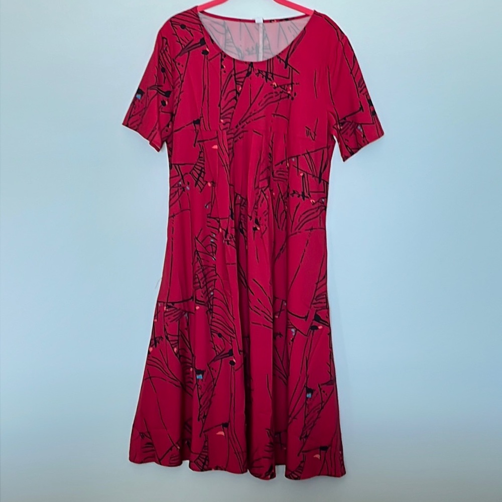 Size M beautiful red silky comfortable dress. Short sleeves.